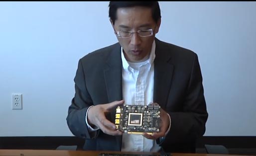 Steve Woo shows a processor and two HBM RAMs on a very compact board